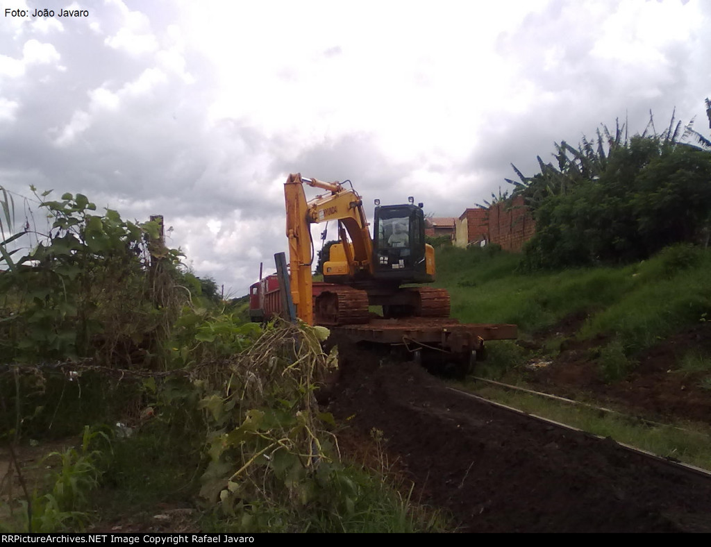 Maintenance team reopening drainage channels